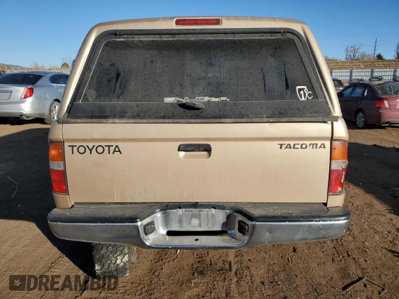 1999 Toyota Tacoma with VIN 4TAPM62N0XZ546880, listed as a Copart auction lot 88327105 with 234,164 mi miles and Salvage Title. Bid and sale history available at DreamBid. Image 6.