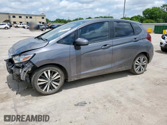 2018 Honda Fit EX with VIN 3HGGK5H88JM707976, listed as a Copart auction lot 58777715 with 83,651 mi miles and Salvage title. Bid and sale history available at DreamBid. Image 1.