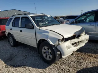 1999 Isuzu Rodeo S z VIN 4S2CM58W0X4306727, wystawiony jako Copart lot #74758994 z przebiegiem 193 850 mil mil oraz Tytuł czysty. Historia ofert i sprzedaży dostępna na DreamBid. Obrazek 4.