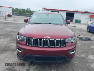 2022 Jeep Grand Cherokee Laredo X with VIN 1C4RJEAG0NC128094, listed as a IAAI auction lot 41402308 with 34,190 mi miles and . Bid and sale history available at DreamBid. Image 12.