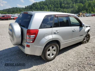 2011 Suzuki Grand Vitara Premium z VIN JS3TD0D29B4103041, wystawiony jako Copart lot #62066985 z przebiegiem 219 727 mil mil oraz Szkoda całkowita • Salvage title. Historia ofert i sprzedaży dostępna na DreamBid. Obrazek 3.
