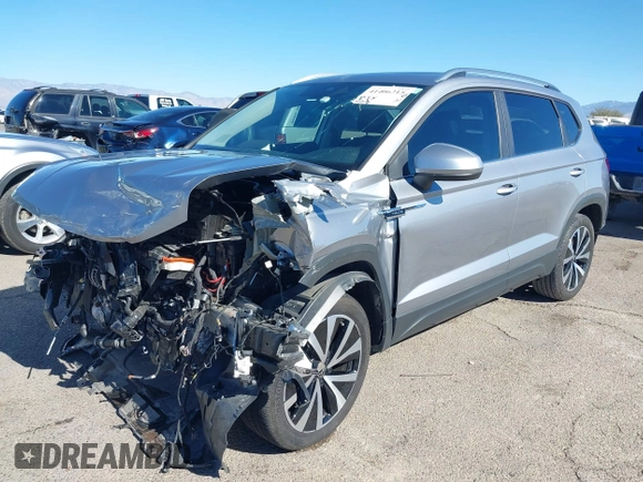 2024 Volkswagen Taos SE z VIN 3VVEX7B21RM001601, wystawiony jako IAAI lot #41406215 z przebiegiem 8 557 mil mil oraz . Historia ofert i sprzedaży dostępna na DreamBid. Obrazek 18.