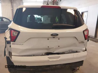 2019 Ford Escape SE z VIN 1FMCU9GDXKUA97147, wystawiony jako IAAI lot #42155997 z przebiegiem 94 829 mil mil oraz . Historia ofert i sprzedaży dostępna na DreamBid. Obrazek 6.