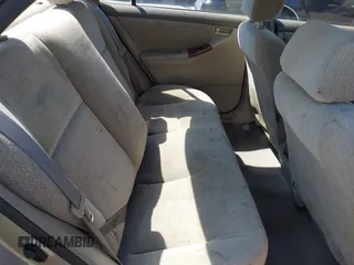 2003 Toyota Corolla CE with VIN 2T1BR32E53C015709, listed as a IAAI auction lot 42057744 with 120,022 mi miles and . Bid and sale history available at DreamBid. Image 8.