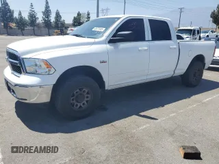 2019 Ram 1500 Big Horn with VIN 1C6RR7TT8KS609377, listed as a Copart auction lot 60875495 with 128,933 mi miles and Salvage title. Bid and sale history available at DreamBid. Image 1.