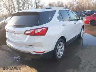 2018 Chevrolet Equinox Premier with VIN 2GNAXVEVXJ6324008, listed as a IAAI auction lot 41877394 with 106,729 mi miles. Bid and sale history available at carsss.com. Image 4.