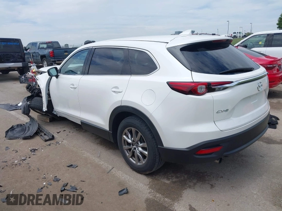 2018 Mazda CX-9 Touring с VIN JM3TCACY0J0214717, выставлен на аукционе IAAI как лот 42331827 с пробегом 116 470 миль миль и . История ставок и продаж доступна на DreamBid. Изображение 3.