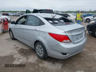 2015 Hyundai Accent GLS with VIN KMHCT4AE5FU883113, listed as a IAAI auction lot 41899701 with 123,023 mi miles and . Bid and sale history available at carsss.com. Image 3.