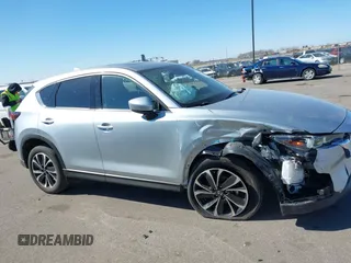 2023 Mazda CX-5 2.5 S Premium Package with VIN JM3KFBDM9P0173453, listed as a IAAI auction lot 41807979 with 34,156 mi miles. Bid and sale history available at carsss.com. Image 13.