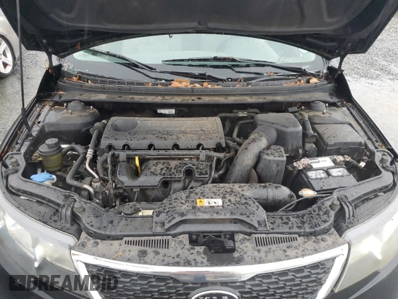 2010 Kia Forte EX z VIN KNAFU4A26A5861366, wystawiony jako Copart lot #51791605 z przebiegiem 161 093 mil mil oraz Szkoda całkowita • Salvage title. Historia ofert i sprzedaży dostępna na DreamBid. Obrazek 11.