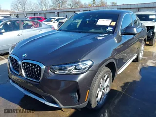 2023 BMW X4 xDrive30i with VIN 5UX33DT00P9S99937, listed as a IAAI auction lot 41261240 with NaN miles. Bid and sale history available at carsss.com. Image 21.