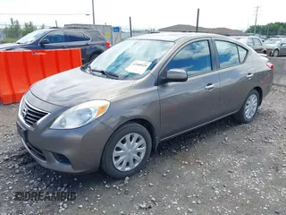 2013 Nissan Versa SV with VIN 3N1CN7AP9DL867511, listed as a IAAI auction lot 42680420 with 158,082 mi miles and . Bid and sale history available at DreamBid. Image 2.
