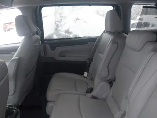 2018 Honda Odyssey Touring with VIN 5FNRL6H8XJB029570, listed as a IAAI auction lot 41485794 with 77,601 mi miles. Bid and sale history available at carsss.com. Image 8.