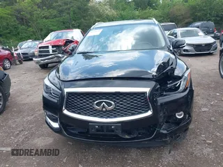 2020 Infiniti QX60 LUXE with VIN 5N1DL0MM8LC516594, listed as a IAAI auction lot 42136299 with 92,747 mi miles. Bid and sale history available at carsss.com. Image 12.