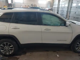 2020 Jeep Cherokee Altitude with VIN 1C4PJMLN6LD647106, listed as a IAAI auction lot 41406440 with 58,788 mi miles. Bid and sale history available at carsss.com. Image 14.