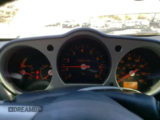 2004 Nissan 350Z Enthusiast with VIN JN1AZ34D84M100633, listed as a Copart auction lot 61036114 with 36,810 mi miles and Salvage Title. Bid and sale history available at DreamBid. Image 9.