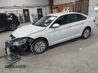 2019 Volkswagen Jetta S z VIN 3VWC57BU6KM129512, wystawiony jako IAAI lot #42205228 z przebiegiem 92 940 mil mil oraz . Historia ofert i sprzedaży dostępna na DreamBid. Obrazek 2.