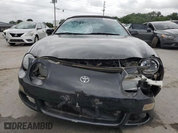 1996 Toyota Celica GT z VIN JT5FG02T3T0031613, wystawiony jako Copart lot #58410225 z przebiegiem 124 899 mil mil oraz Szkoda całkowita • Salvage title. Historia ofert i sprzedaży dostępna na DreamBid. Obrazek 5.