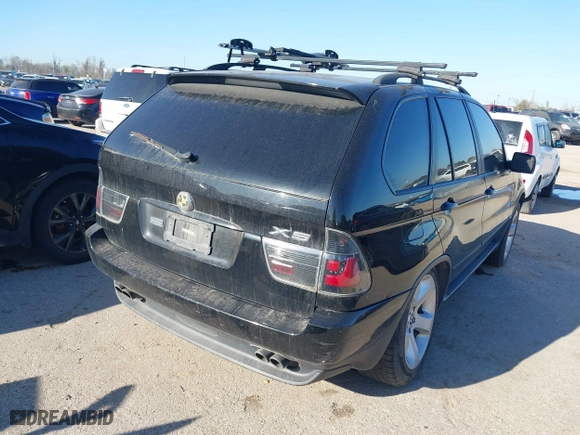 2004 BMW X5 4.4i with VIN 5UXFB53504LV06486, listed as a IAAI auction lot 41674534 with 164,974 mi miles. Bid and sale history available at carsss.com. Image 4.