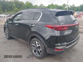2021 Kia Sportage EX with VIN KNDPNCAC5M7848673, listed as a IAAI auction lot 42373684 with 108,409 mi miles and . Bid and sale history available at DreamBid. Image 3.