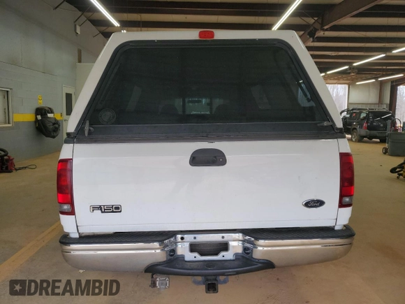 2001 Ford F-150 XL with VIN 1FTRX17L51NB25752, listed as a Copart auction lot 48721235 with 179,941 mi miles and Salvage title. Bid and sale history available at DreamBid. Image 6.