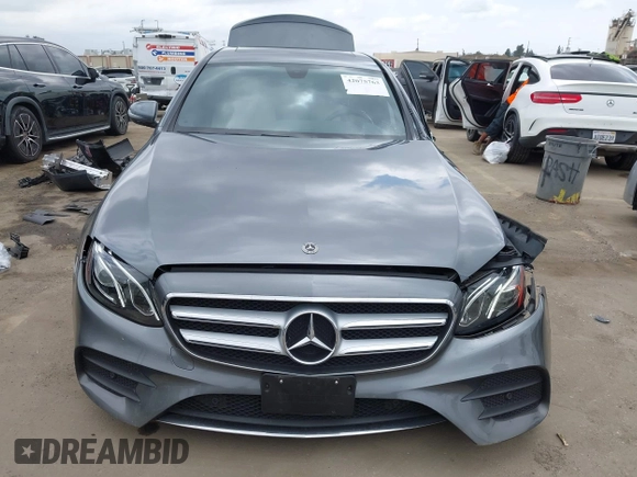 2018 Mercedes-Benz E 300 with VIN WDDZF4JBXJA477047, listed as a IAAI auction lot 42075763 with 62,843 mi miles and . Bid and sale history available at DreamBid. Image 12.