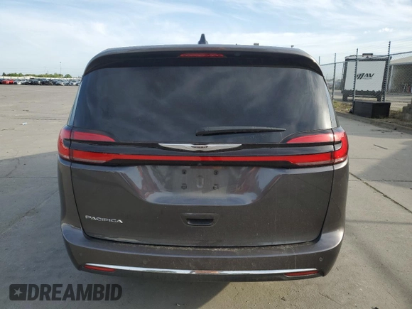 2023 Chrysler Pacifica Touring L z VIN 2C4RC1BG0PR514820, wystawiony jako Copart lot #52978115 z przebiegiem 87 980 mil mil oraz Szkoda całkowita • Salvage title. Historia ofert i sprzedaży dostępna na DreamBid. Obrazek 6.