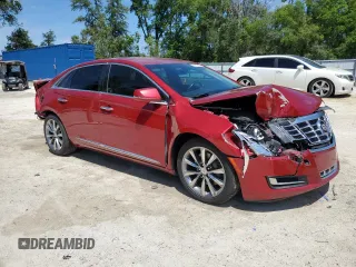 2013 Cadillac XTS z VIN 2G61N5S30D9208999, wystawiony jako Copart lot #52818875 z przebiegiem 99 793 mil mil oraz Szkoda całkowita • Salvage title. Historia ofert i sprzedaży dostępna na DreamBid. Obrazek 4.
