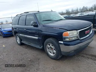 2005 GMC Yukon SLT with VIN 1GKEC13T45J139885, listed as a IAAI auction lot 41796394 with 229,494 mi miles. Bid and sale history available at carsss.com. Image 1.