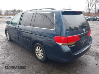 2010 Honda Odyssey EX with VIN 5FNRL3H41AB061674, listed as a IAAI auction lot 41954700 with 115,722 mi miles. Bid and sale history available at carsss.com. Image 3.
