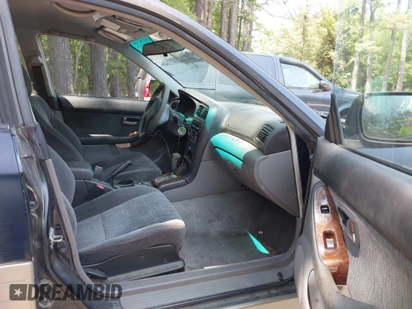 2002 Subaru Legacy Outback with VIN 4S3BH665727616036, listed as a IAAI auction lot 42389717 with 135,503 mi miles and . Bid and sale history available at DreamBid. Image 5.