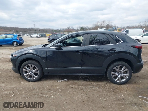2021 Mazda CX-30 Preferred z VIN 3MVDMBCL5MM205824, wystawiony jako IAAI lot #41991942 z przebiegiem 58 112 mil mil oraz . Historia ofert i sprzedaży dostępna na DreamBid. Obrazek 14.