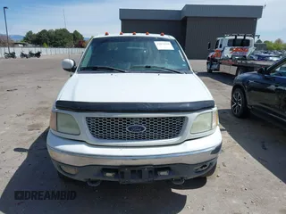 2003 Ford F-150 XLT with VIN 1FTRW08L23KD35077, listed as a IAAI auction lot 42071330 with 1 mi miles. Bid and sale history available at carsss.com. Image 11.