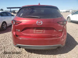 2017 Mazda CX-5 Grand Touring with VIN JM3KFBDL0H0118057, listed as a Copart auction lot 50121335 with 148,275 mi miles and Salvage Title. Bid and sale history available at carsss.com. Image 6.