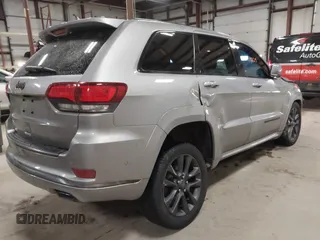 2018 Jeep Grand Cherokee High Altitude with VIN 1C4RJFCGXJC502580, listed as a IAAI auction lot 41419329 with 90,713 mi miles. Bid and sale history available at carsss.com. Image 4.