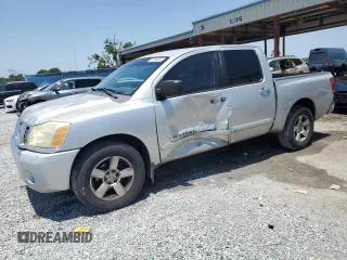 2007 Nissan Titan XE z VIN 1N6BA07A57N242314, wystawiony jako Copart lot #57034825 z przebiegiem 266 676 mil mil oraz Szkoda całkowita • Salvage title. Historia ofert i sprzedaży dostępna na DreamBid. Obrazek 1.