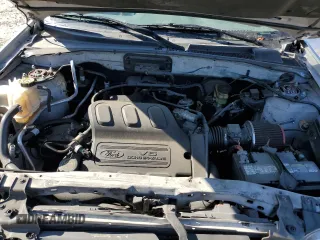 2002 Ford Escape XLS Choice with VIN 1FMYU01142KD48997, listed as a Copart auction lot 53340815 with 172,235 mi miles and Salvage title. Bid and sale history available at DreamBid. Image 12.