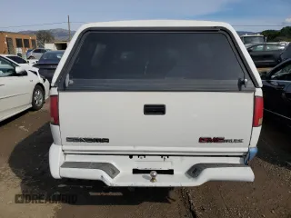 1997 GMC Sonoma SLS with VIN 1GTCS19X7V8517253, listed as a Copart auction lot 43829035 with 102,976 mi miles and Salvage Title. Bid and sale history available at carsss.com. Image 6.