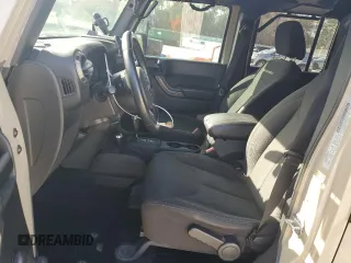 2018 Jeep Wrangler JK Unlimited Sport S with VIN 1C4BJWDG2JL871384, listed as a Copart auction lot 49990495 with 66,770 mi miles and Salvage Title. Bid and sale history available at carsss.com. Image 7.