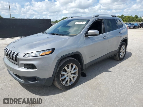 2016 Jeep Cherokee Limited with VIN 1C4PJMDB5GW244734, listed as a Copart auction lot 64608765 with 166,953 mi miles and Salvage title. Bid and sale history available at DreamBid. Image 1.