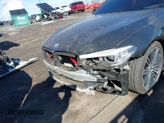 2019 BMW 5 Series 540i xDrive with VIN WBAJE7C54KWD55100, listed as a IAAI auction lot 41476251 with 74,733 mi miles and . Bid and sale history available at carsss.com. Image 19.