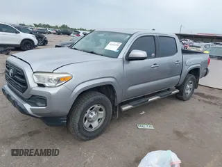 2017 Toyota Tacoma SR with VIN 5TFAX5GN6HX083614, listed as a IAAI auction lot 42314254 with 104,407 mi miles and . Bid and sale history available at DreamBid. Image 18.