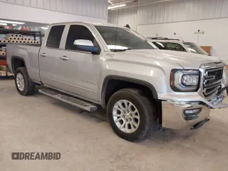 2018 GMC Sierra 1500 SLE z VIN 1GTV2MEC7JZ118876, wystawiony jako IAAI lot #41731335 z przebiegiem 157 839 mil mil oraz . Historia ofert i sprzedaży dostępna na DreamBid. Obrazek 1.