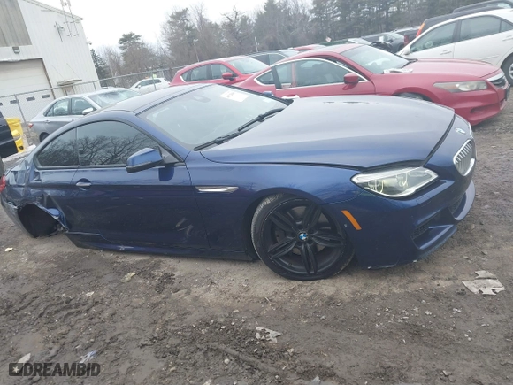 2016 BMW 6 Series 650i xDrive with VIN WBA6H7C5XGGA05033, listed as a IAAI auction lot 41723869 with 132,227 mi miles. Bid and sale history available at carsss.com. Image 13.
