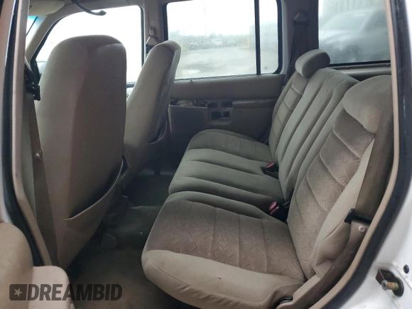 2000 Ford Explorer XLT z VIN 1FMZU73E2YZB82279, wystawiony jako Copart lot #86607864 z przebiegiem 46 620 mil mil oraz Szkody całkowita. Historia ofert i sprzedaży dostępna na DreamBid. Obrazek 11.