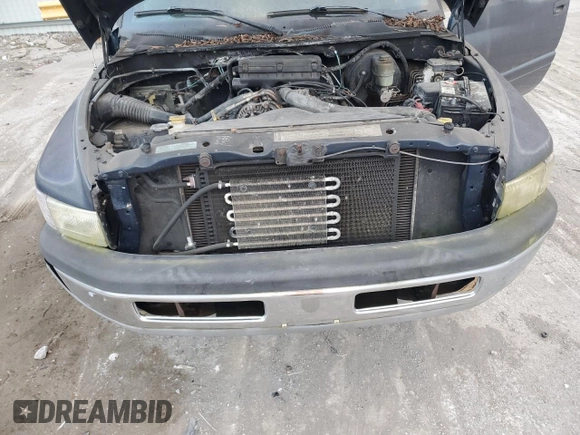 2001 Dodge 2500 z VIN 3B7KF26Z51M560104, wystawiony jako Copart lot #79052294 z przebiegiem Nie podano mil oraz Czysty tytuł • Clean title. Historia ofert i sprzedaży dostępna na DreamBid. Obrazek 11.