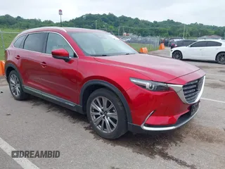 2021 Mazda CX-9 Signature with VIN JM3TCBEY9M0511928, listed as a IAAI auction lot 42231925 with 26,367 mi miles and . Bid and sale history available at DreamBid. Image 1.
