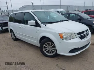 2014 Dodge Grand Caravan SE with VIN 2C4RDGBG2ER366165, listed as a IAAI auction lot 41940241 with 144,789 mi miles and . Bid and sale history available at DreamBid. Image 1.