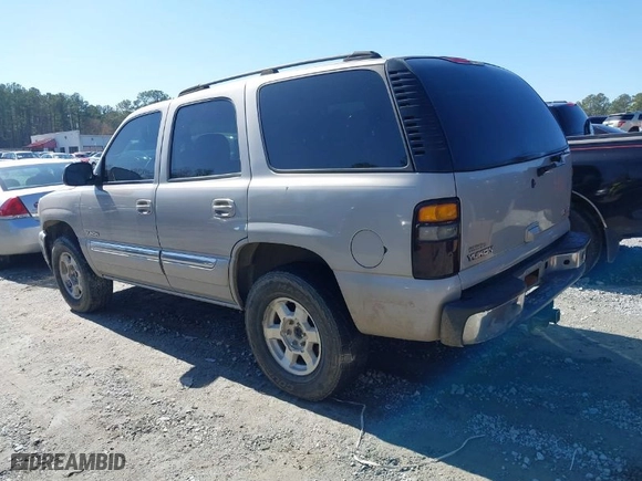 2005 GMC Yukon SLT with VIN 1GKEC13TX5J104235, listed as a IAAI auction lot 41574343 with 291,358 mi miles. Bid and sale history available at carsss.com. Image 3.