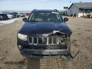 2014 Jeep Compass Sport with VIN 1C4NJCBA7ED925577, listed as a Copart auction lot 83315104 with 139,078 mi miles and Salvage Title. Bid and sale history available at carsss.com. Image 5.